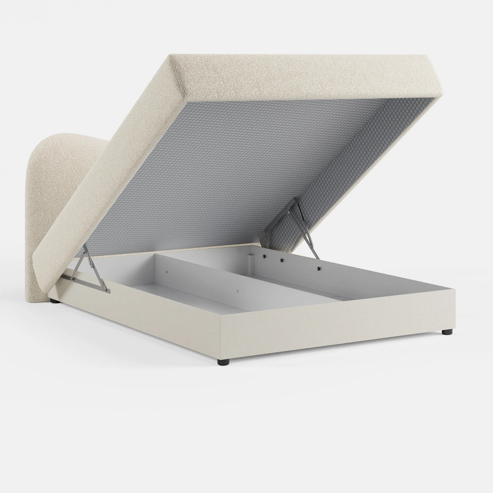 מיטה זוגית מרופדת Saga בבוקלה עם גב גלי