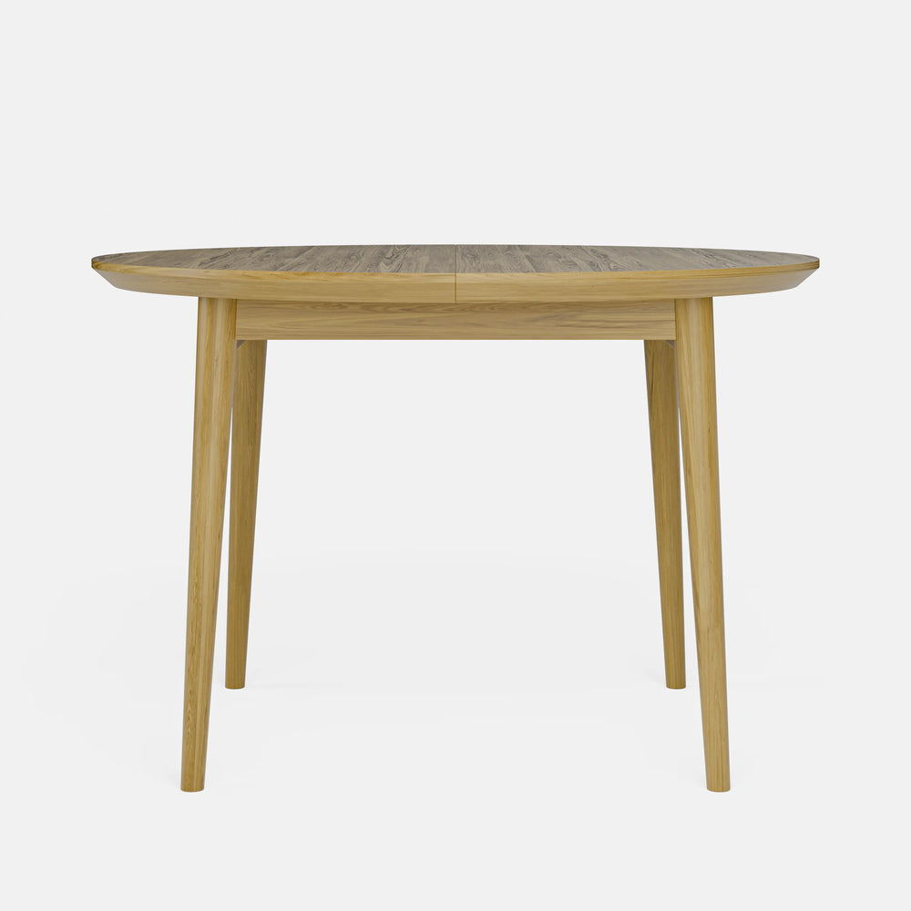 שולחן אוכל עגול נפתח מעץ אלון בעיצוב מודרני חמים