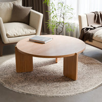 שולחן סלון עגול Fjell עם פלטת פורניר אלון ורגליים פיסוליות מעץ מלא | פוני סטייל